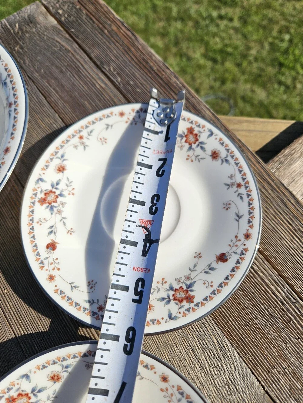 Noritake White Porcelain Dinnerware with Orange Floral Border